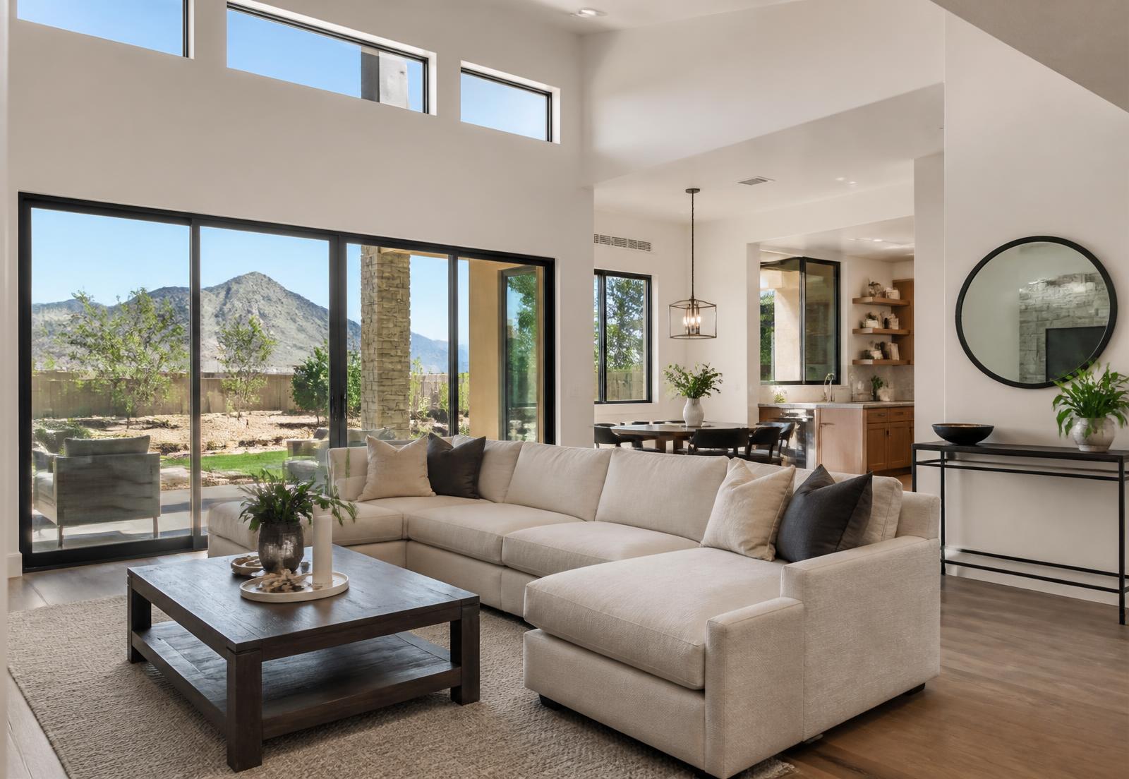 Bright, clean Phoenix-area living room with desert mountain views